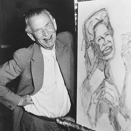 Otto Dix, lachend im Atelier